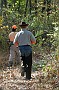 slides/DSC_3267_20081018-007.jpg  The morning's braces having run, two handlers  take their Weims into the Junior field to train a bit on some leftover quail.
