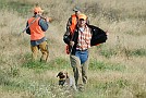 slides/0027_081109-061_DSC_3937.jpg  After a walk around the back course and some intense time in the bird field, handler and dog are both cooked.